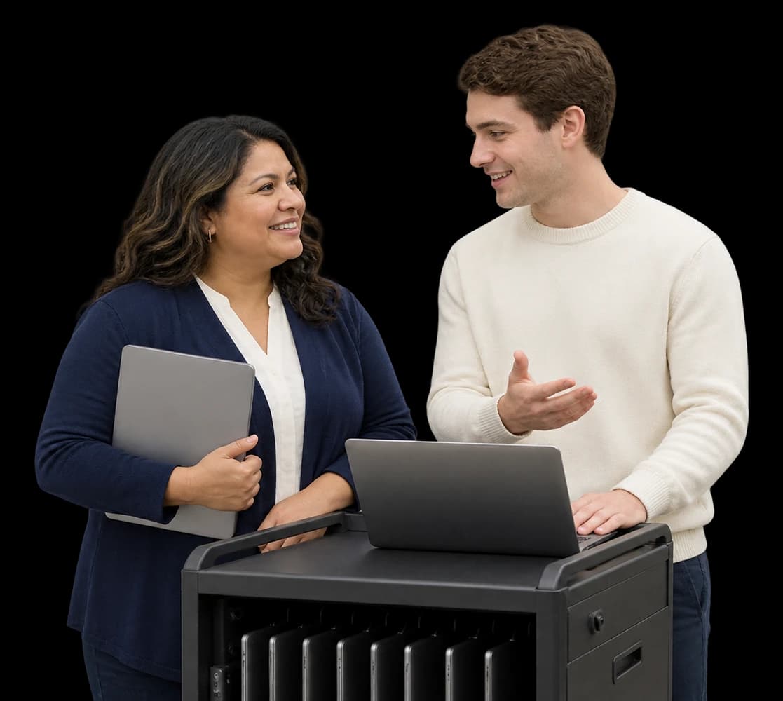 A school technology coordinator and an edtech rep stand beside a laptop cart.